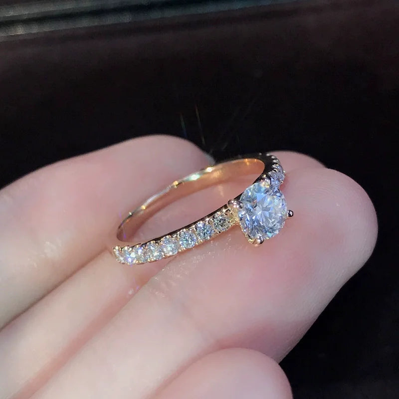 “Elegant Gold-Tone Ring with Sparkling Glass Diamonds”