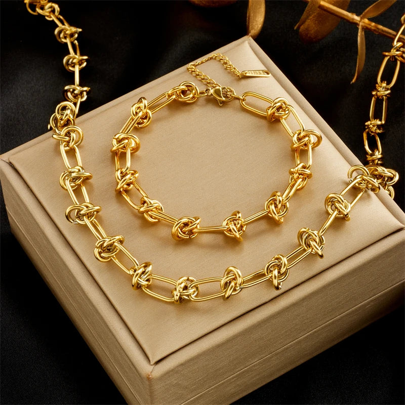 "Twist Knot Duo – Gold & Silver Jewelry Set"